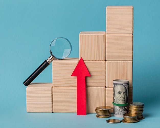 Wooden blocks with magnifying glass and growth arrow