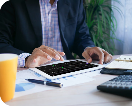 Trader monitoring a live performance dashboard on a tablet